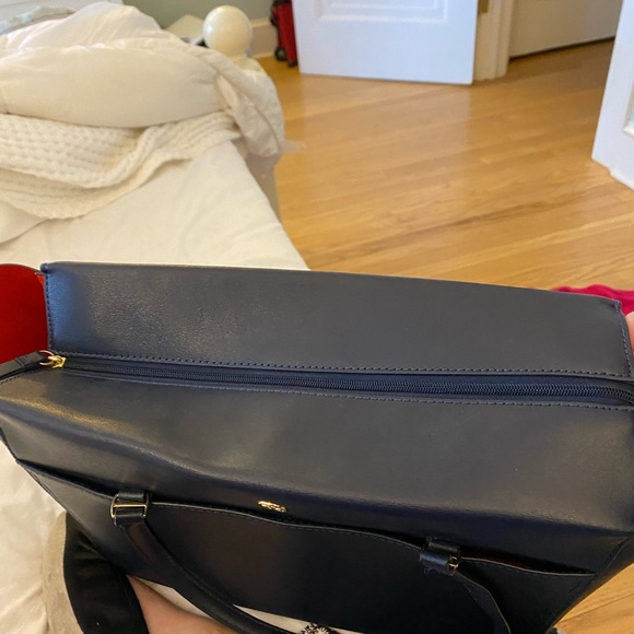 Tory Burch zip up Robinson navy blue tote with orange interior. - Picture 8 of 11